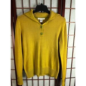 mustard yellow August Silk sweater with a shawl-style collar and large buttons